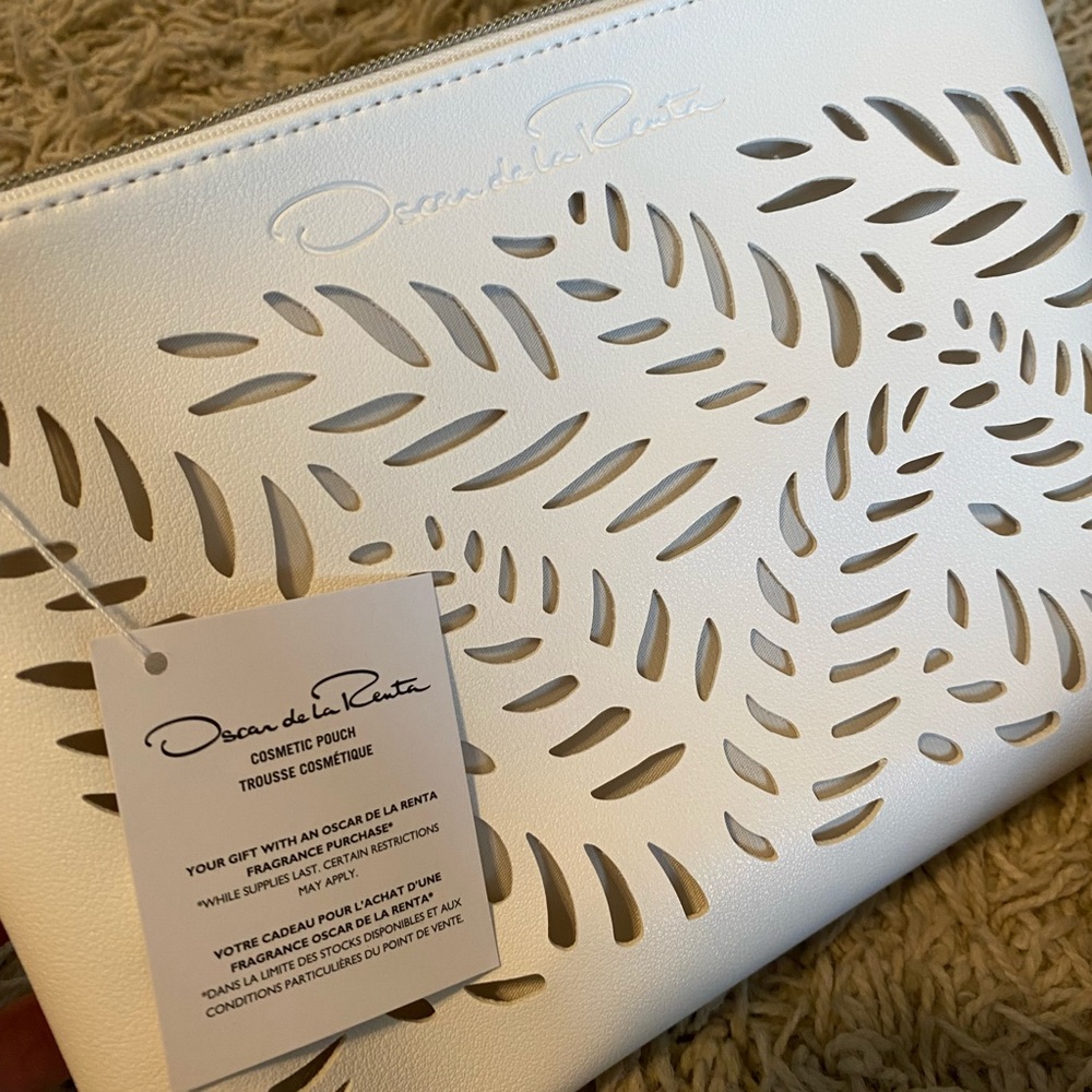 White make up bag with leaf detail
